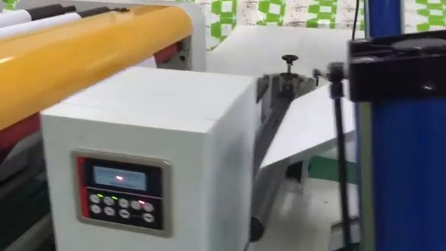 Листорезательная машина HQJ-1100D с устройством пробивки отверстий