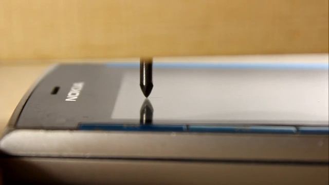 Nokia X3. Нанесение царапины дисплей смотреть онлайн