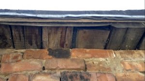 Стену у гаража нужно штукатурить...