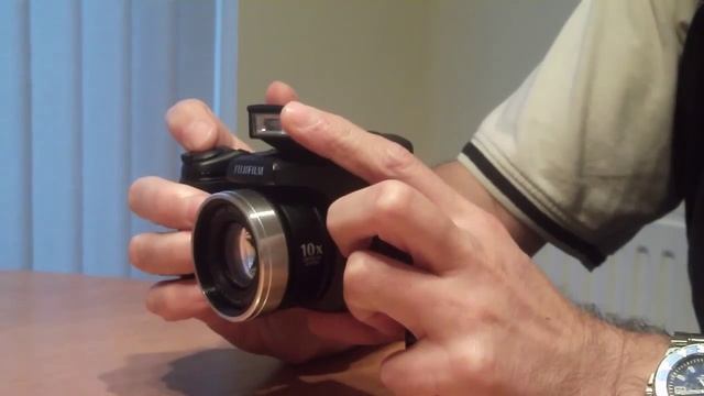 Fujifilm FinePix S5700 7.1 MP Digital Camera, with sticking flash смотреть онлайн