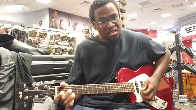 Playing a used Taylor 2B2-X at Guitar Center in Las Vegas, NV смотреть онлайн