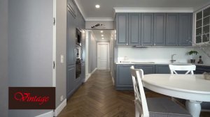 Английская ёлочка (инженерная доска) и белые межкомнатные двери в интерьере квартиры.