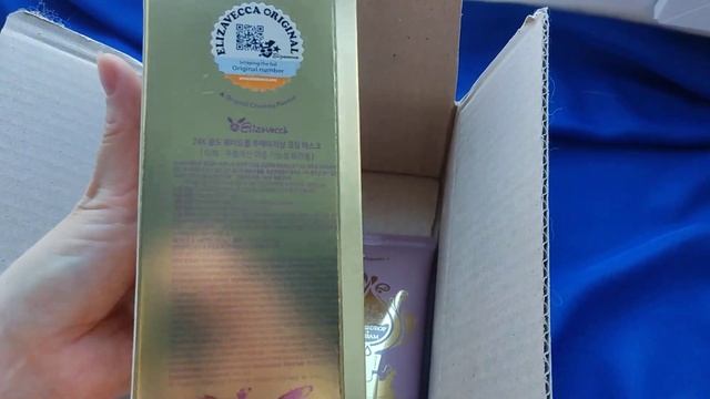 Распаковка посылки с корейского сайта Елизавекка. 2 крутые маски для лица смотреть онлайн