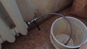 Устройство для промывки радиаторов системы отопления.