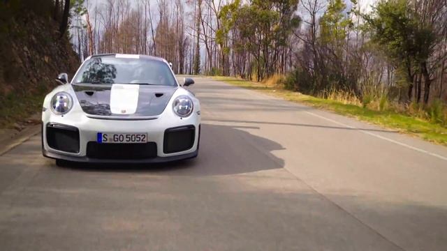 Porsche 911 GT2 RS In White Driving On The Road