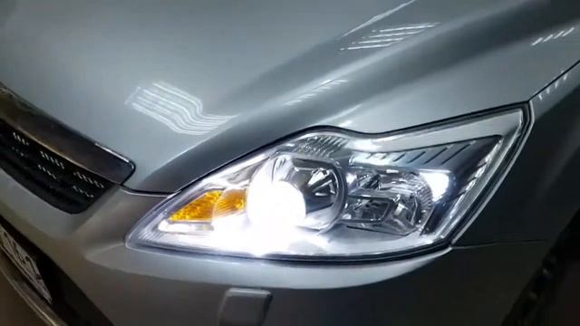 Ford Focus замена штатных ксеноновых линз на биксеноновые линзы Hella 3R.