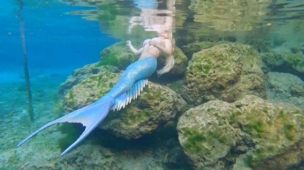 Mermaid Melissa sun bathing