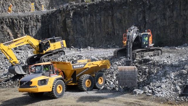 Volvo EC 750E Excavator Loads Volvo A60H Articulated Dumper