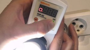 Реле напряжения в розетку РНР-02: описание, настройка, подключение.