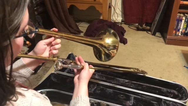 Opening a trombone case and constructing/deconstructing the trombone. смотреть онлайн