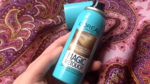 Спрей для мгновенного закрашивания отросших корней волос.