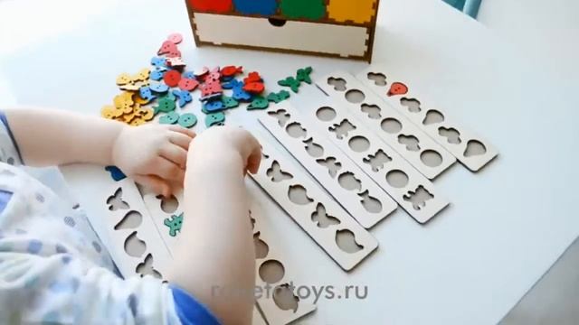 Развивающая игрушка Волшебный комодик. Пуговки.