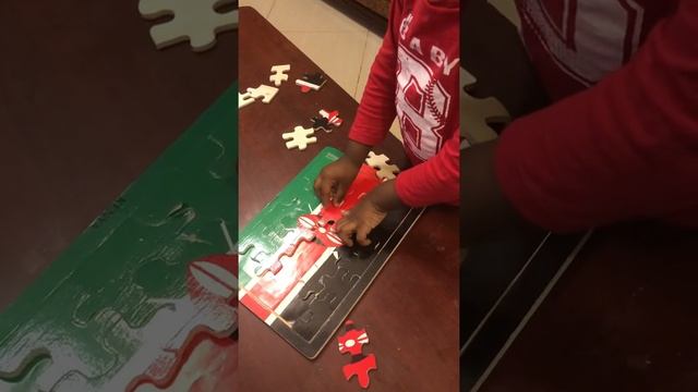 Aachu doing Kenya flag puzzle himself смотреть онлайн