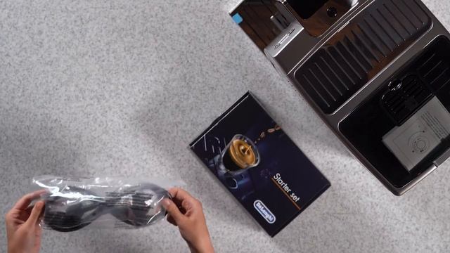 Распаковка кофемашины De'longhi ECAM 350.75 S смотреть онлайн