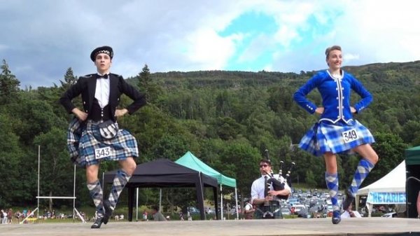 Great Highland Fling performance by competitors at Kenmore Highland Games in Perthshire, Scotland