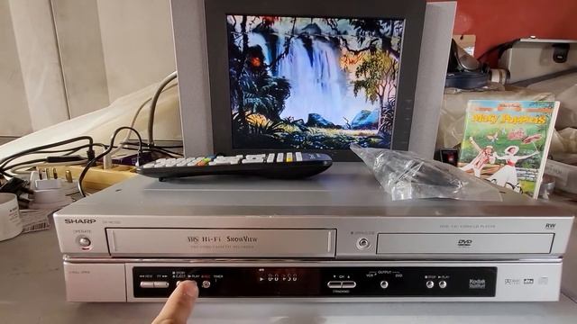 VIDEOREGISTRATORE VHS DVD PLAYER SHARP DV-NC100 смотреть онлайн