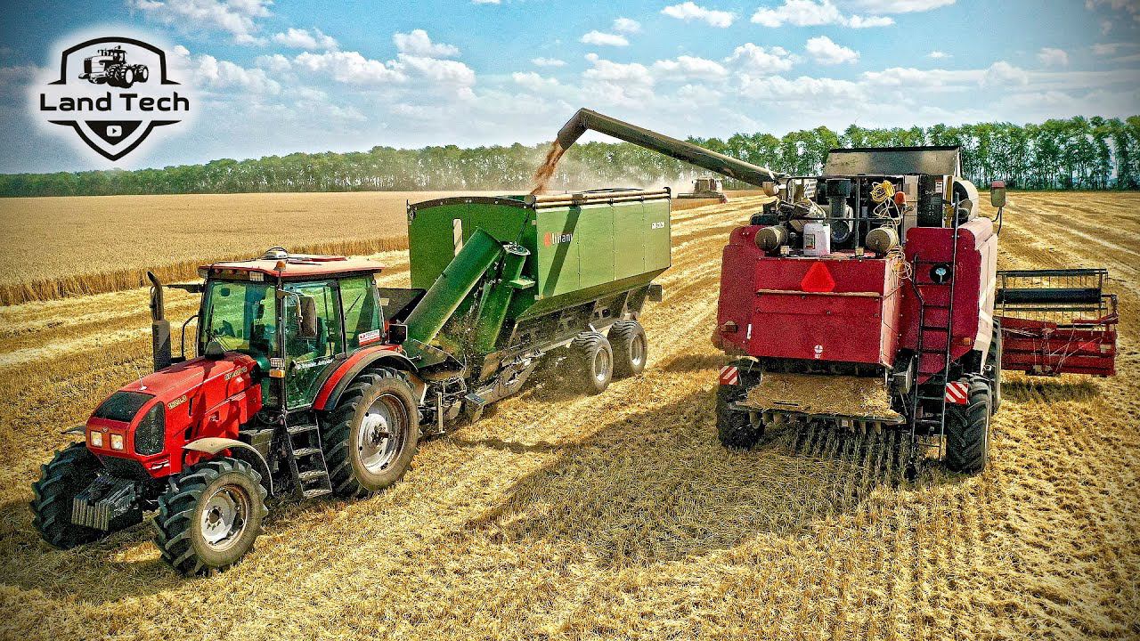 Новые комбайны ПОЛЕСЬЕ, трактор МТЗ 1523 и перегрузчик ЛИЛИАНИ БП-22/28 на уборке урожая! смотреть онлайн