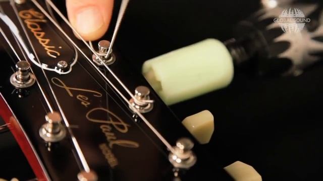 Как поменять струны на электрогитаре с фиксированным бриджем (перевод Global Sound) смотреть онлайн