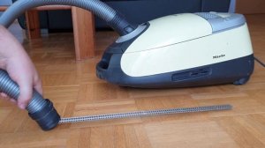 Vacuuming up model train with miele vacuum