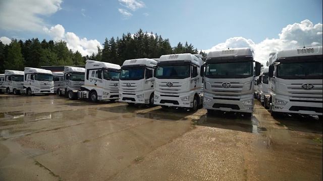 Отгрузка 100 седельных тягачей и прицепов FAW смотреть онлайн