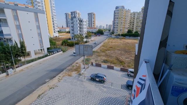 Квартира 1+1 Duplex с аквапарком в 100 метрах от моря с песчаным пляжем. Мерсин недвижимость Турция смотреть онлайн