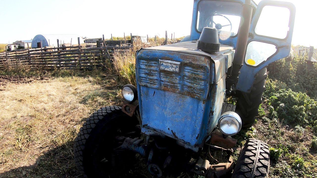 Трактор т40ам Кошу траву цепями\ Вспашка 2мя корпусами в ЗИМУ смотреть онлайн