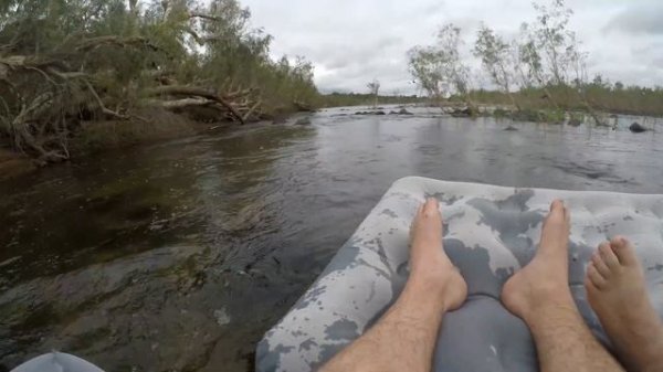 Floating down the river on a Kmart couch!