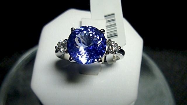 БРИЛЛИАНТОВОЕ КОЛЬЦО 0.36КТ С ТАНЗАНИТОМ В 3.95 КТ смотреть онлайн