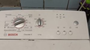 Bosch Classixx 6 . С вертикальной загрузкой .