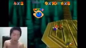 Злой корейский геймер играет в super mario 64