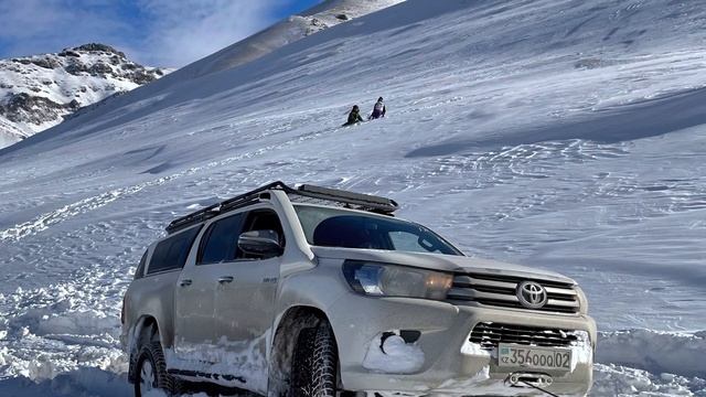 Toyota Hilux In Deep Snow. Off - Road. Mountains. Kazakhstan.