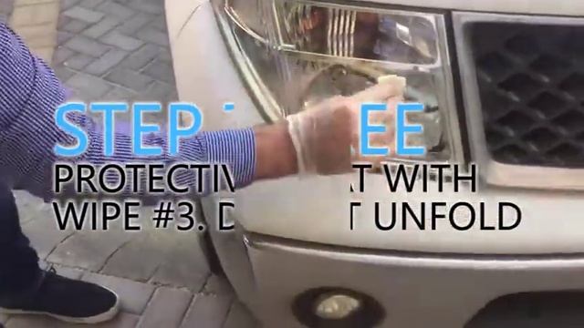 Faded headlights are getting fixed on white Nissan смотреть онлайн
