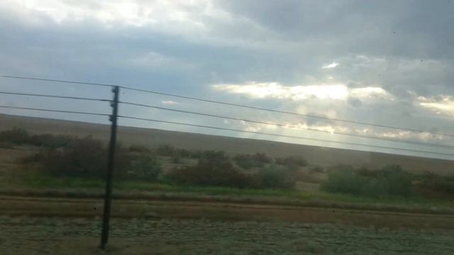 Степь Астраханской области весной из окна поезда The steppe of Astrakhan in spring from train windo смотреть онлайн