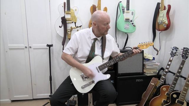 Fender Telecaster American Ultra in Pearl White. смотреть онлайн