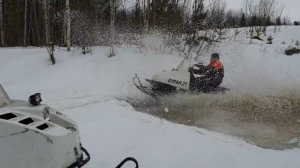 Езда на двух *буранов* по мокрому снегу и лужам.