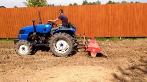выравнивание участка методом культивации минитрактором