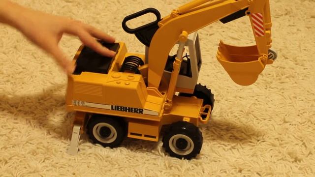Игрушка Bruder Экскаватор колёсный Liebherr М1:16 смотреть онлайн