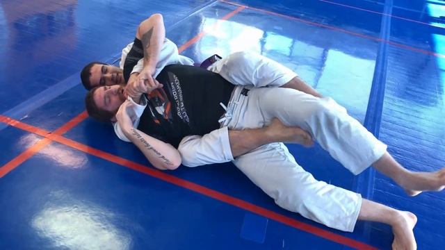 BJJ Black Belt Showing Escapes