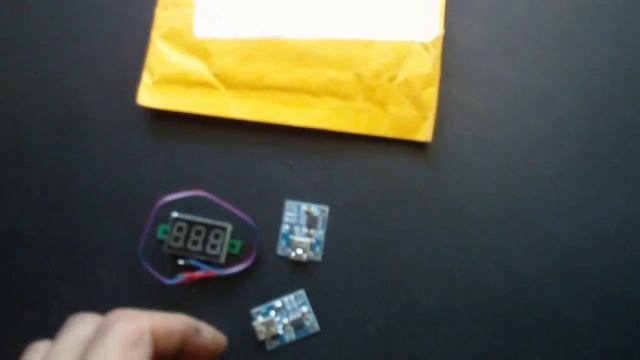 Распаковка "100 В Вольтметр 3 провода" и "Мини USB TP4056 Липо Батареи Зарядное Устройство" смотреть онлайн