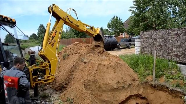 12 этап работы экскаватора-погрузчика ДЭМ 310 завершение рытья котлована с телескопом смотреть онлайн