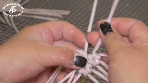 Цветок сакуры из газетных трубочек.