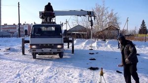 Вкручивание винтовых свай зимой