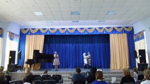 Пела гармошка негромко