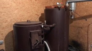 Котёл на опилках, шелухе и щепе.