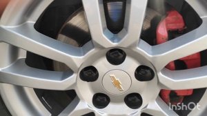 Китайские колпачки на гайки колес на Шевроле Авео т-300