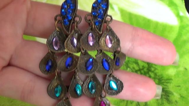 сережки в форме павлина смотреть онлайн