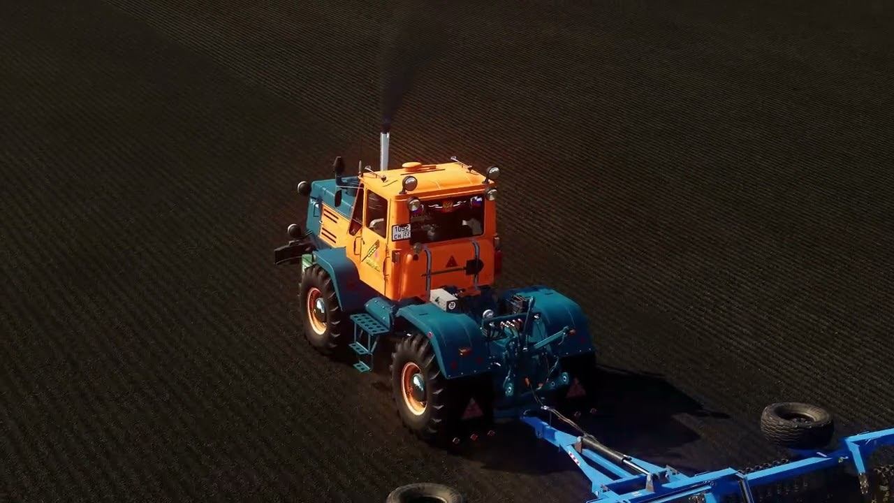 Трактор Т-150К прикатывает поле на новой карте... смотреть онлайн