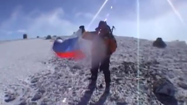 Флаг России на пике "Сочи 2014" смотреть онлайн