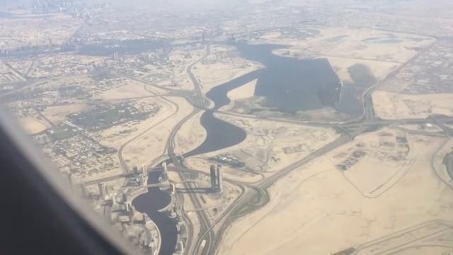 Фонтан в Дубае. Вид из самолёта на Дубай. Персидский залив. смотреть онлайн