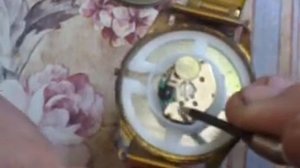 Как извлечь заводную головку из наручных часов??